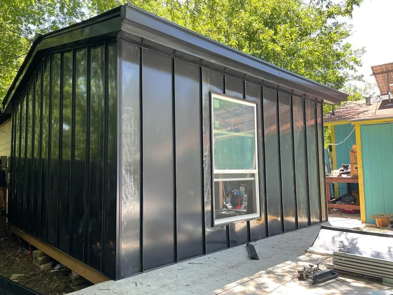 Black standing seam metal wall panels for Metal Roof Installation in Coolidge