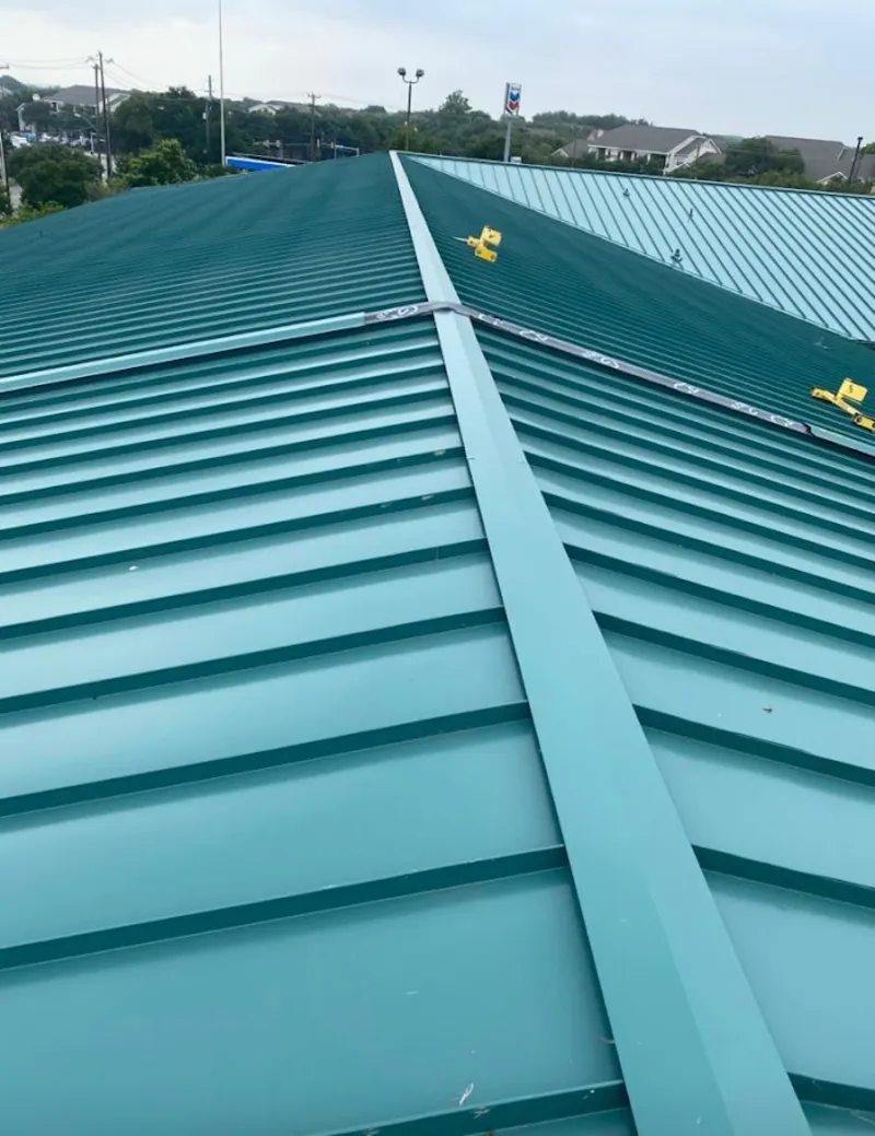 Green commercial metal roof ridge and valley for Metal Roof Repair in Coolidge