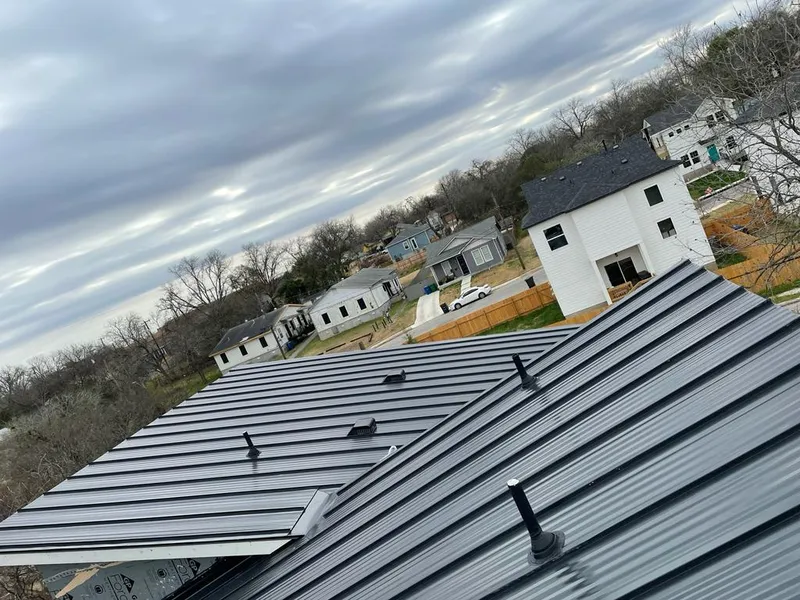 Standing seam metal roof panels with vents for Skylight Repair in Coolidge